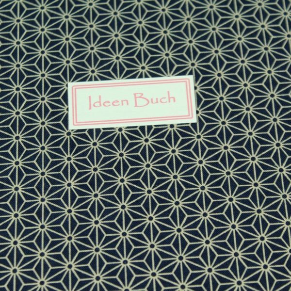 Notizbuch mit einem blau creme gemusterten Baumwollstoff bezogen