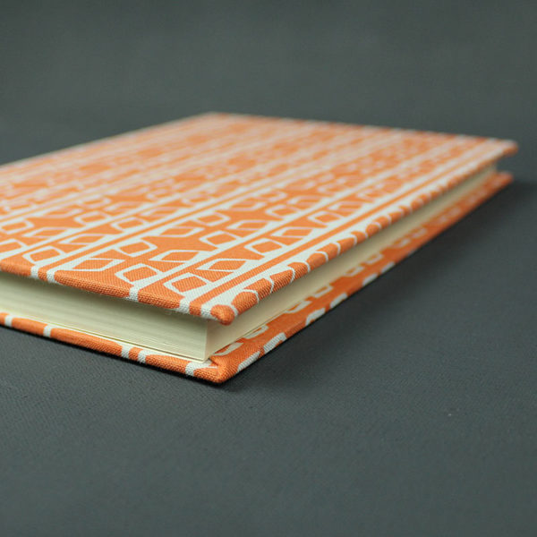 Orange weiß gemustertes Notizbuch blanko DIN A5