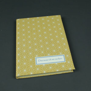 Gelb weißes DIN A 5 Notizbuch mit japanischem Sternchenmuster