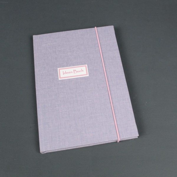 Fliederfarbenes Notizbuch DIN A5 mit rosa Gummikordel