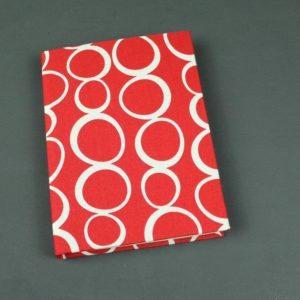 DIN A6 Notizbuch in rot mit großen weißen Kreisen
