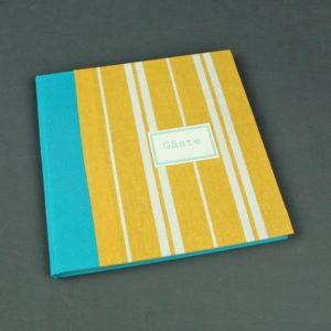 Türkis gelb weiß gestreiftes Gästebuch