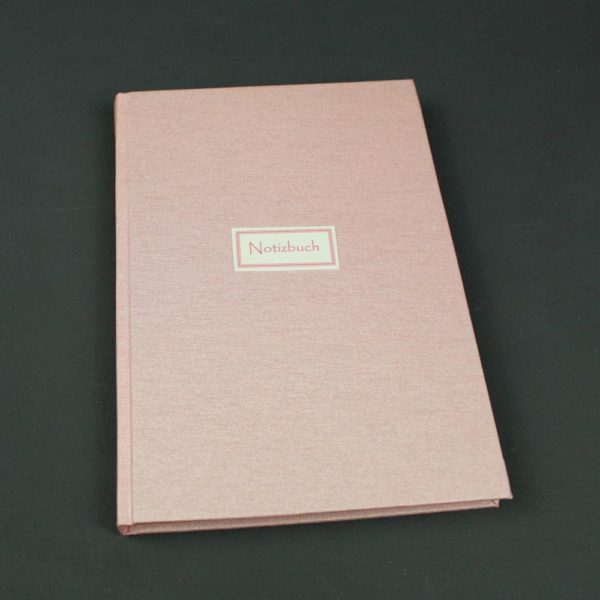 Notizbuch in zartem perlmutt rosa mit bunten Registerseiten