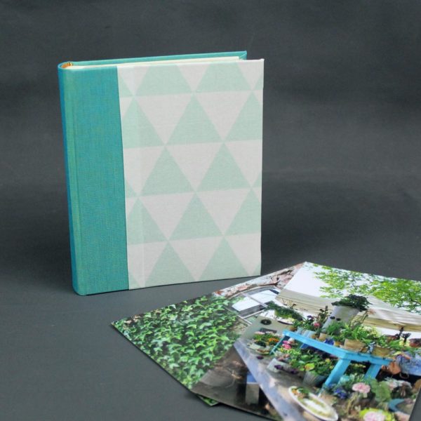 Einsteckalbum türkis weiß für Fotos im Postkartenformat