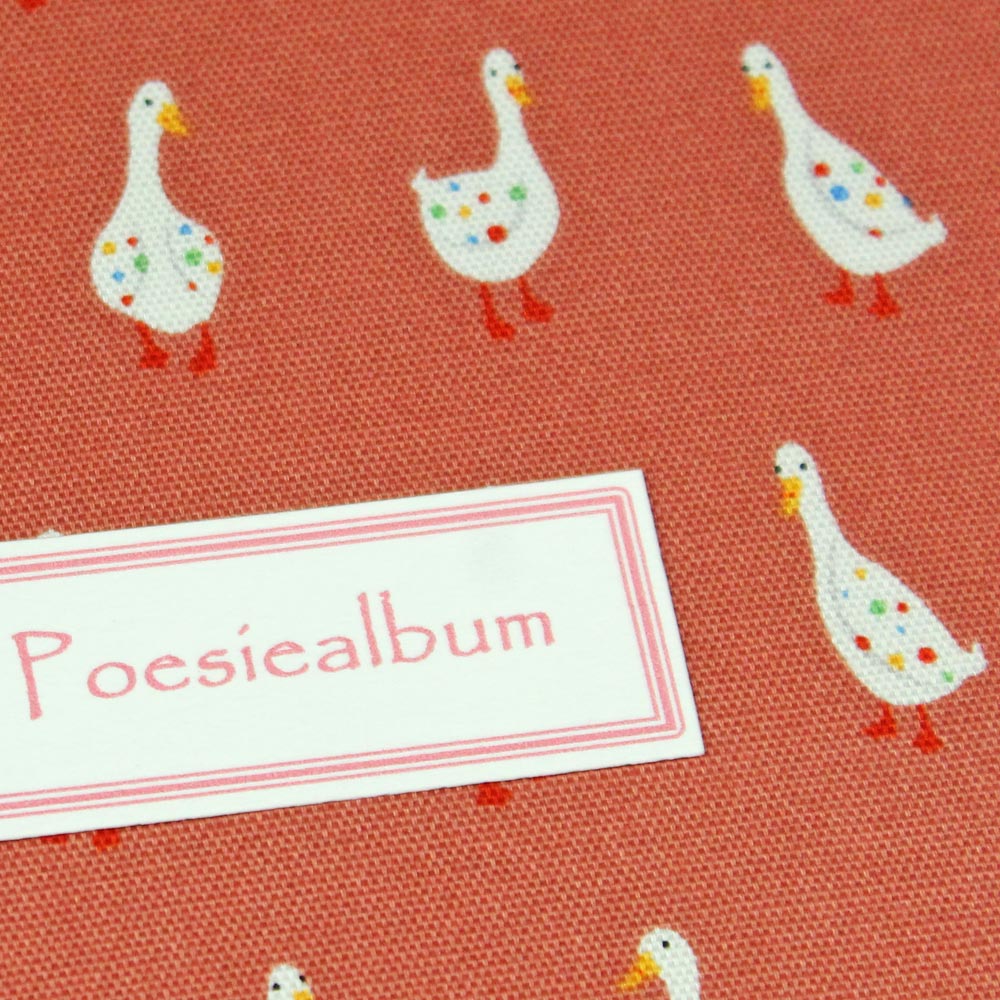 Poesiealbum orange mit weißen Gänsen