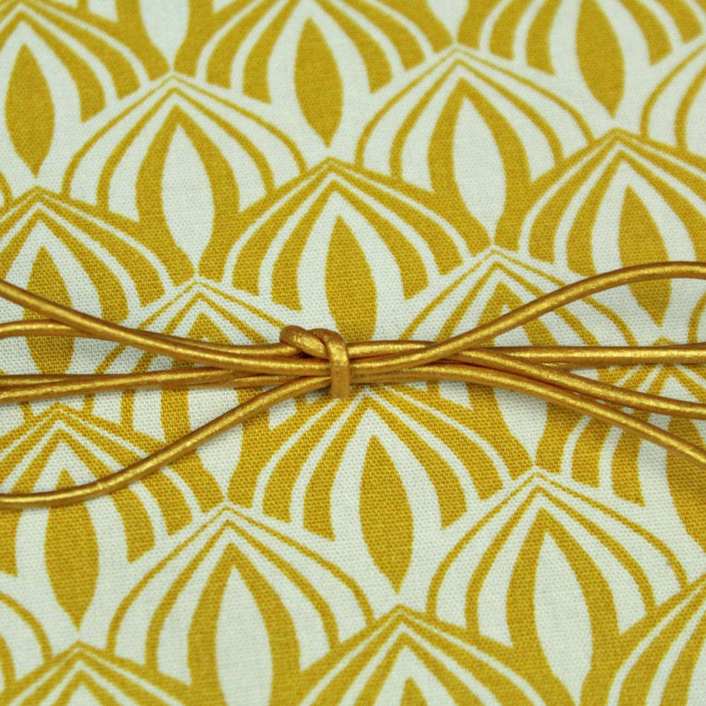 Notizbuch gelb weiß mit goldenem Lederband